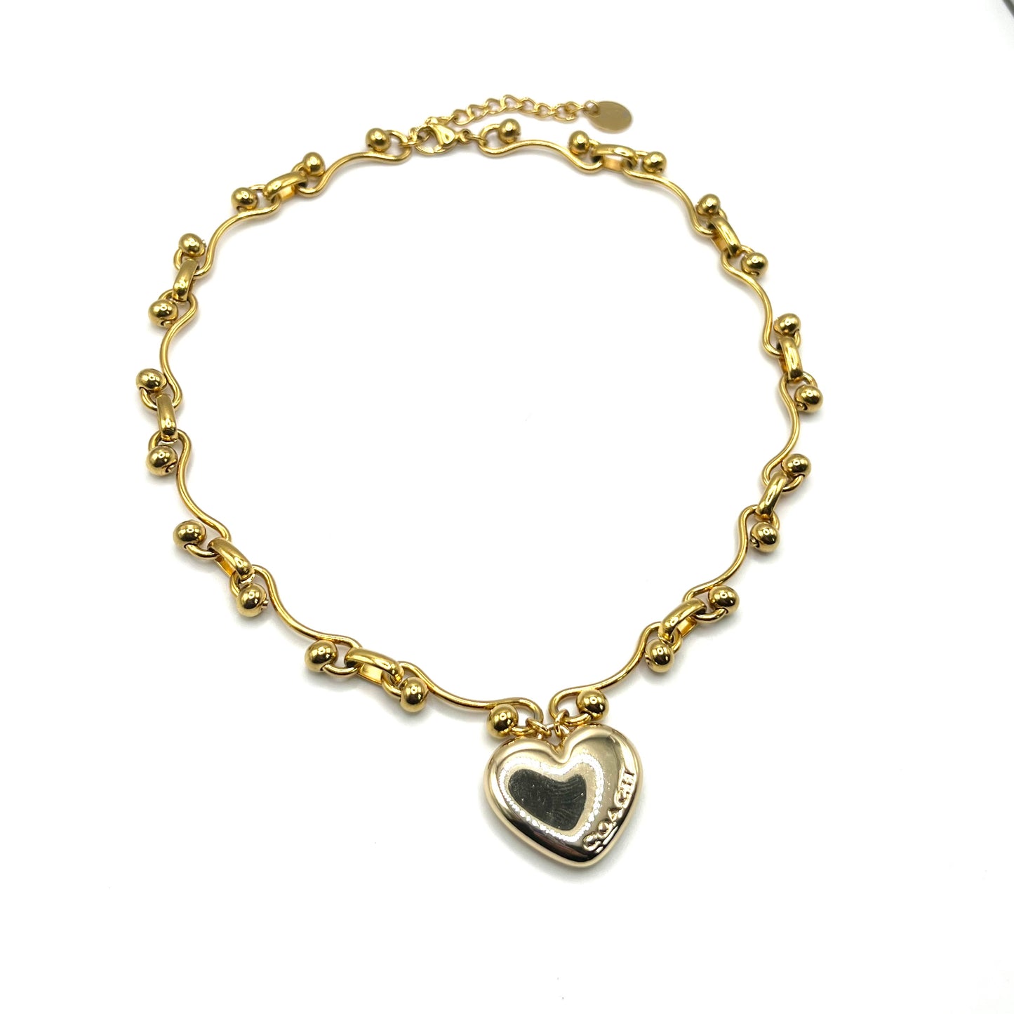 Collier COACH en Love